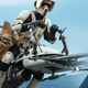 A 12-inch Scout Trooper toy riding a speeder bike from Star Wars.